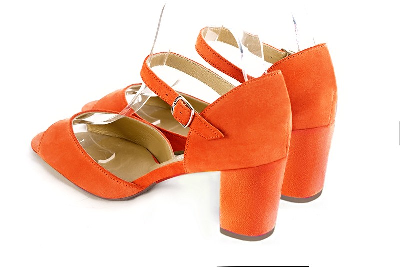 Clementine orange women's closed back sandals, with an instep strap. Square toe. Medium block heels. Rear view - Florence KOOIJMAN